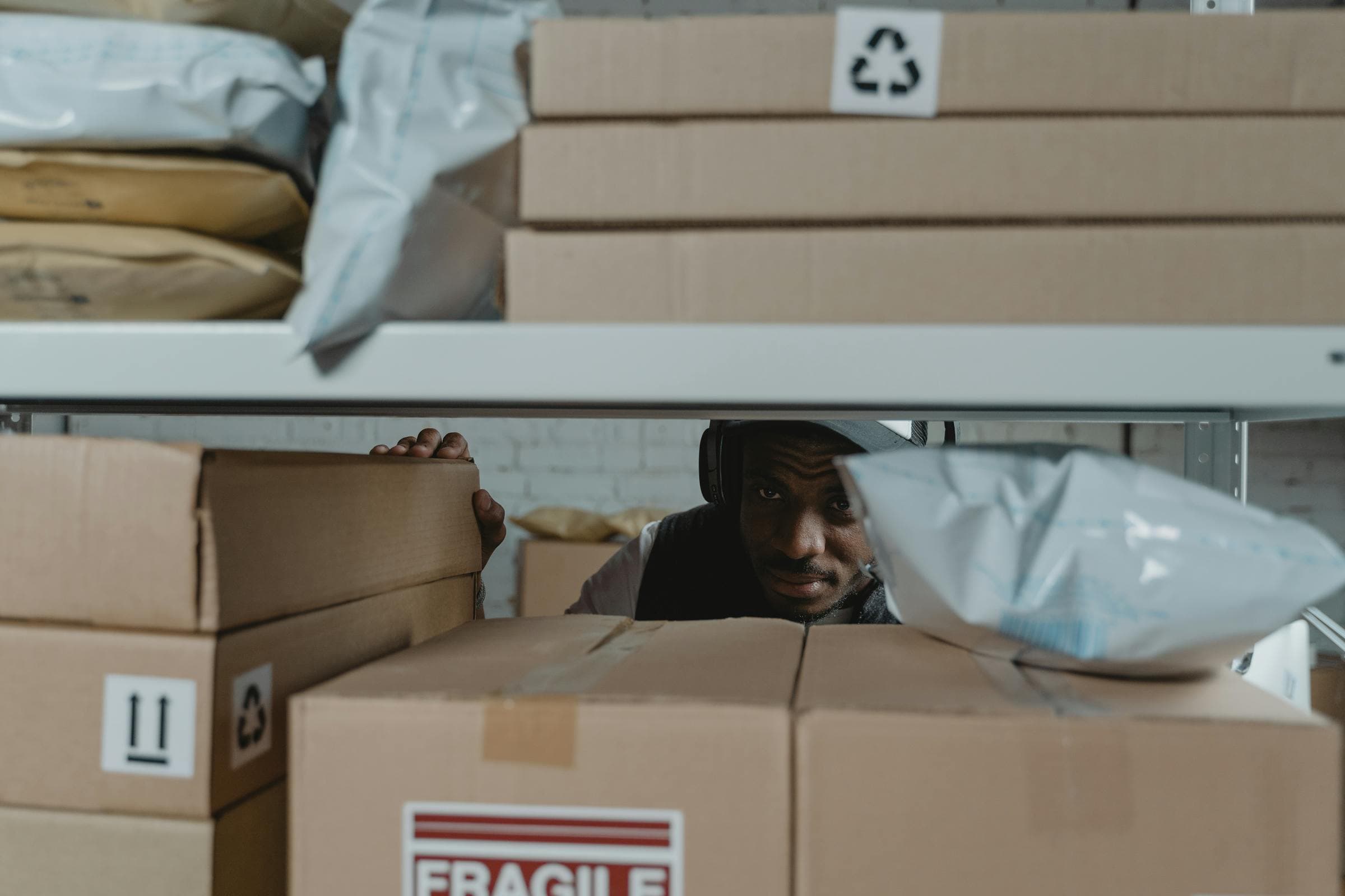 Supplier quality team auditing inventory handling and traceability flow in a warehouse